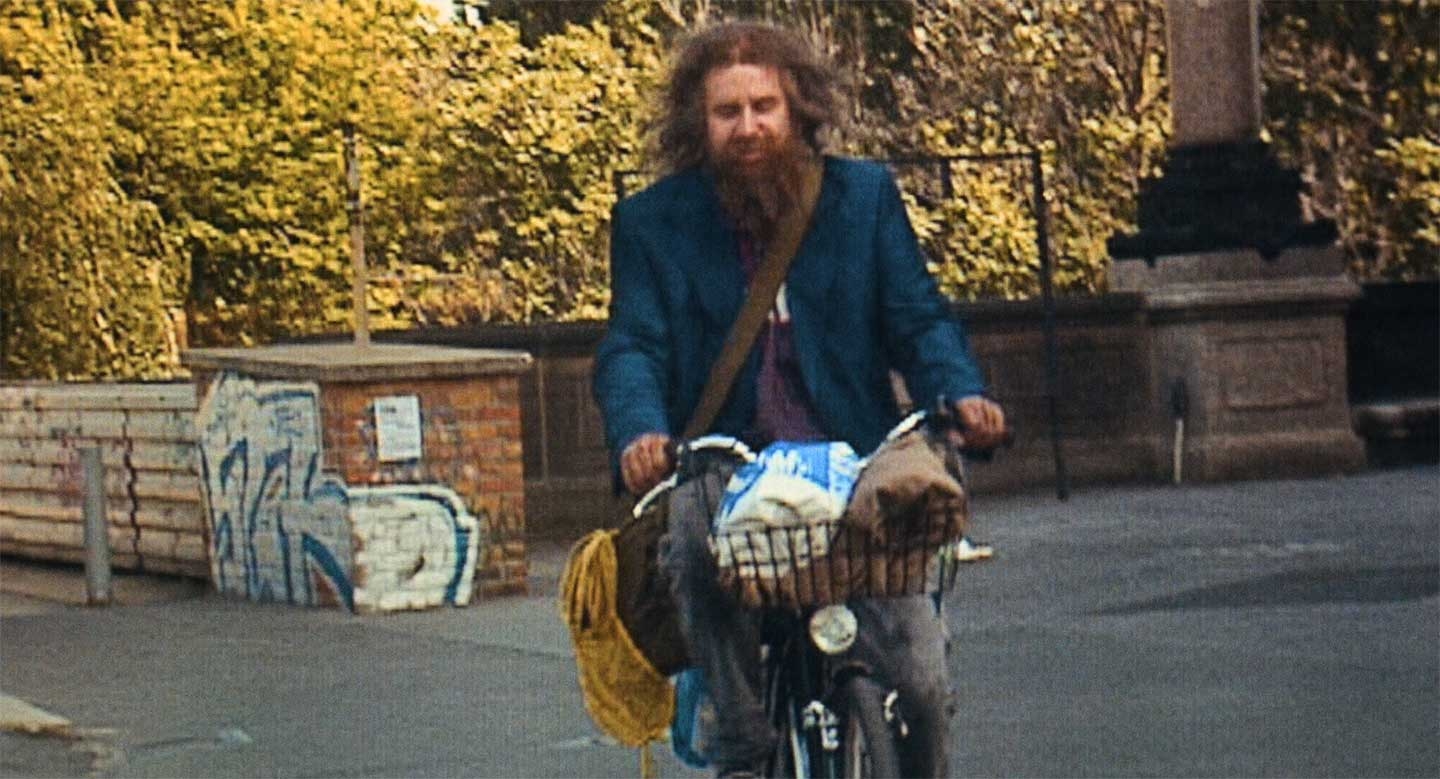 Homeless Man rides bike